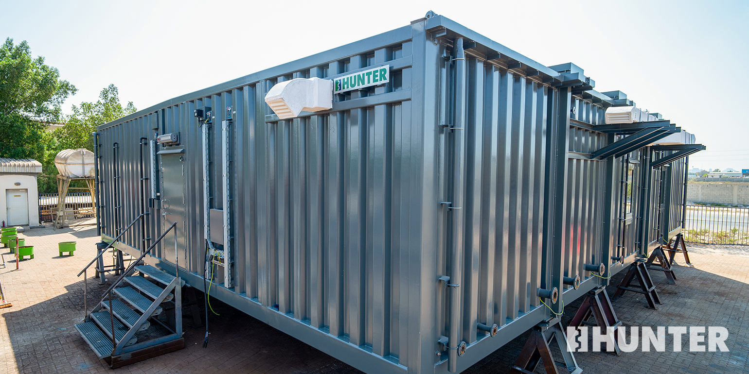 Front view of a dark gray Hunter Zone 2 ATEX blast-resistant modular building